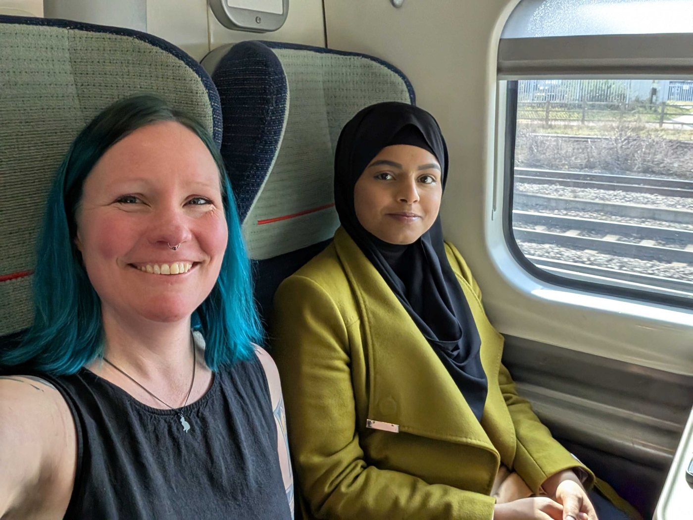 Peak colleagues working together while travelling